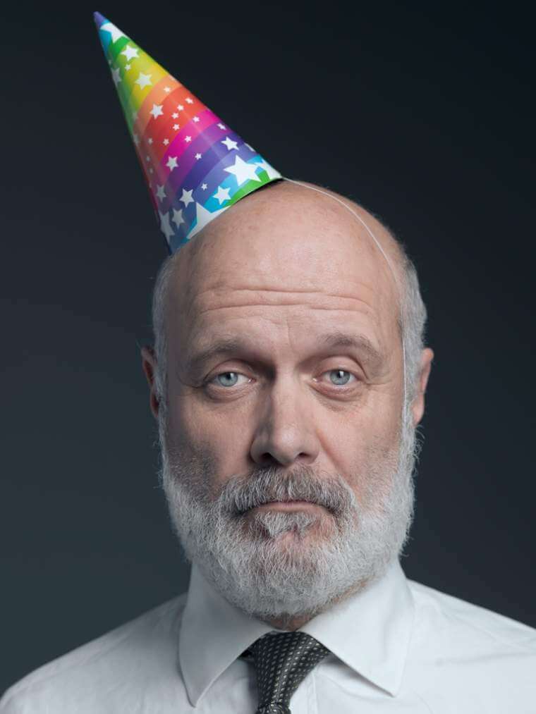 funny-senior-bald-man-with-party-hat