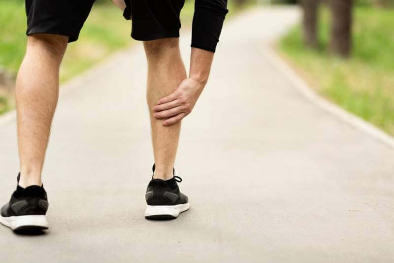 male-runner-is-suffering-from-calf-pain