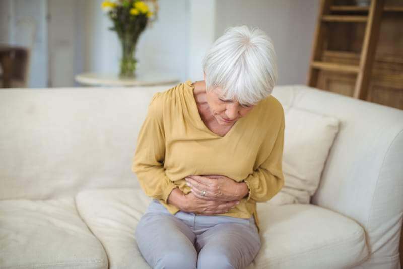 senior-woman-suffering-from-stomach-pain
