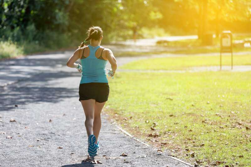 young-woman-running-at-the-park