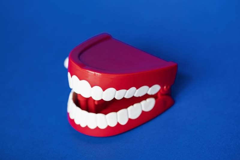 artificial-teeth-background-bite-blue